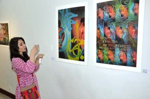 Visitors keenly viewing stuff during the inaugurating ceremony of the Two Person Exhibition titled "HAQ" organized by PNCA & Nomad Gallery at PNCA.