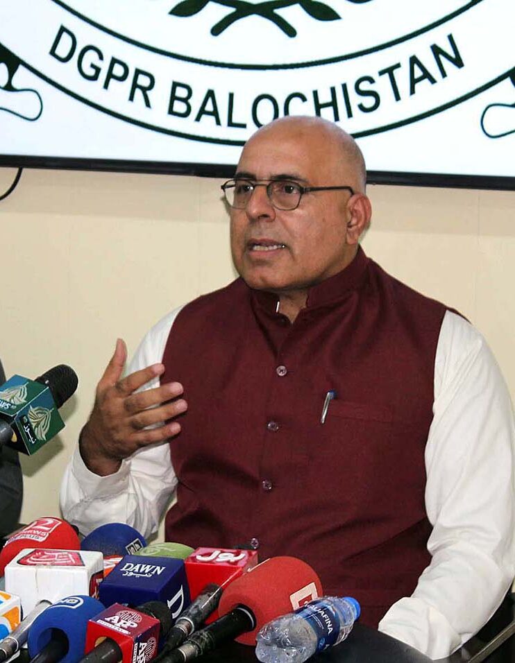 Caretaker Information Minister Jan Achakzai addresses a press conference at DGPR