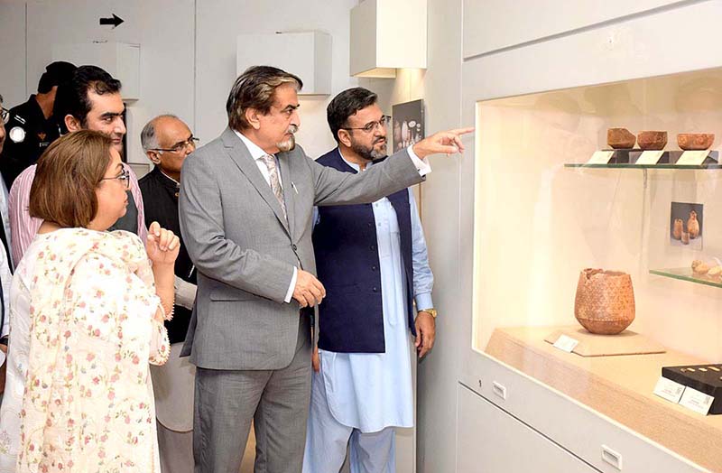 Federal Minister for National Heritage and Culture Jamal Shah taking round of Islamabad Museum during inaugural ceremony of week-long cultural activities being organization in connection with Pakistan Defence Day