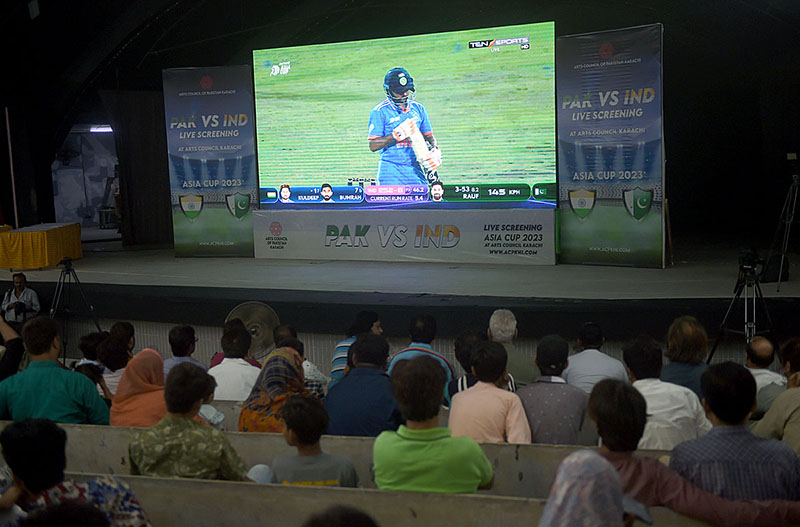 Fans are watching Pak-India Asia Cup 2023 match on a large screen at Arts Council of Pakistan.