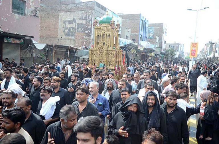 A large number of mourners attending the Chehlum procession to ...