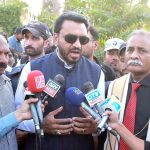 Caretaker Federal Minister for Human Rights Khalil George talking to media person on his arrival