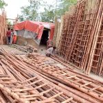 Workers busy in preparing bamboo ladders at his workplace
