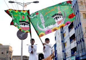 Children participating in procession on the occasion of Eid Milad-un-Nabi (PBUH). Muslims all over the world celebrate the Birthday of Holy Prophet Muhammad (PBUH) by participating in religious processions, ceremonies