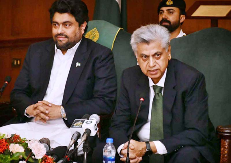 The Caretaker Federal Minister for Information & Broadcasting Murtaza Solangi addressing the press conference at Governor House Karachi. Governor Sindh kamran Khan Tessori also present on the occasion