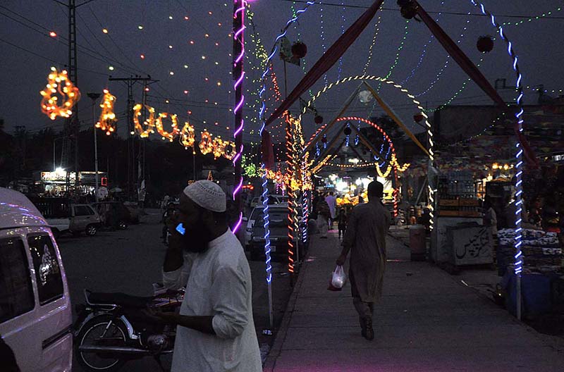 An illuminated view of colorful lights in connection with Eid Milad-un-Nabi (PBUH) celebrations.