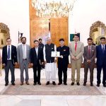 President Dr. Arif Alvi in a group photo with a delegation of Tang Chinese International Education and Technology (Pvt) Ltd led by Mr. Song Jianying, which called on him, at Aiwan-e-Sadr.