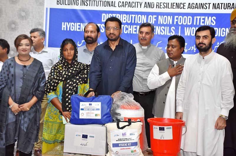 Caretaker Federal Minister for Human Rights and Women Empowerment, Khalil George, addressing the distribution ceremony of non food items to the Christian community in Jaranwala