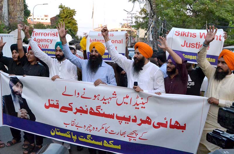 The Pakistani Sikh community is demonstrating outside the Lahore Press Club against the killing of Sikh leader Pradeep Singh in Canada