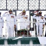 Commander Karachi Rear Admiral Muhammad Saleem presents Salute after laying wreath at Mazar-e-Quaid on commemoration of 58th Navy Day