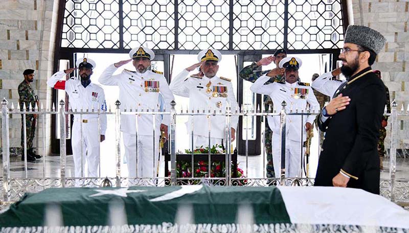 Commander Karachi Rear Admiral Muhammad Saleem presents Salute after laying wreath at Mazar-e-Quaid on commemoration of 58th Navy Day