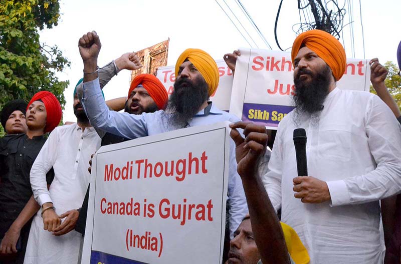 The Pakistani Sikh community is demonstrating outside the Lahore Press Club against the killing of Sikh leader Pradeep Singh in Canada
