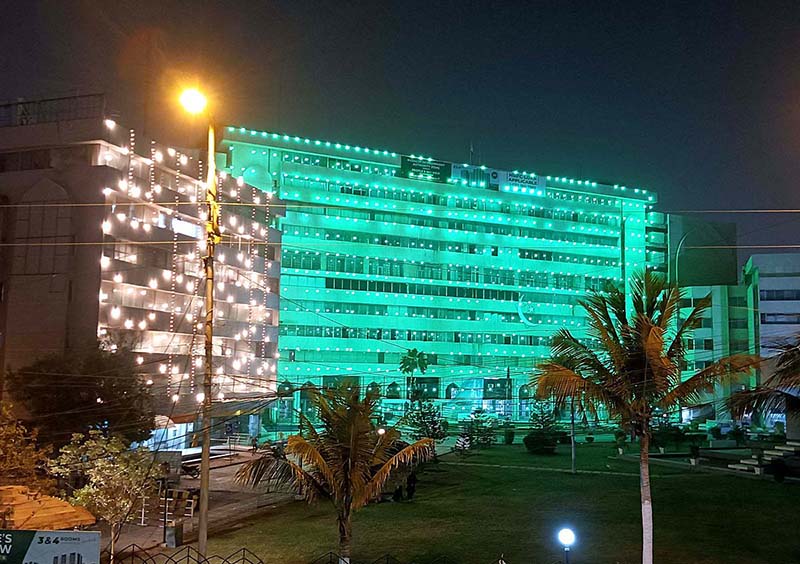 An illuminated view of decorated Civic Center building with colorful lights in connection with Eid Milad-un-Nabi (PBUH) celebrations