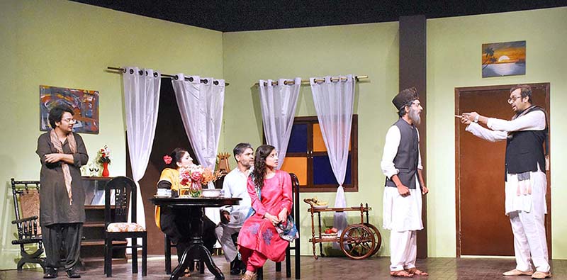 Aritists performing in a play “Biwi Ho Tho Aisi’ during Pakistan Theatre Festival 2023 organised by Arts Council of Pakistan Karachi