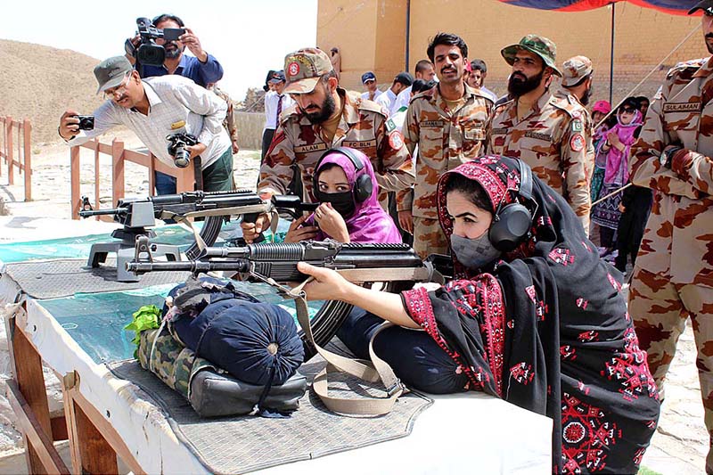 Teachers and Students of Govt Elementary College Jinnah Town Quetta experiencing gunshot at Shooting Range Quetta during their visit on the occasion of Defence Day