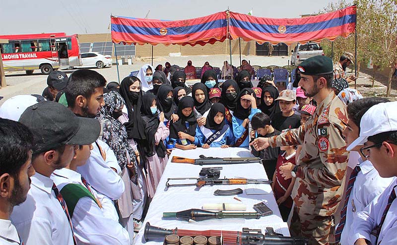 Teachers and Students of Govt Elementary College Jinnah Town Quetta experiencing gunshot at Shooting Range Quetta during their visit on the occasion of Defence Day