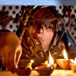 A devotee lits-up earth lamps at Data Darbar in connection with 980th Urs celebrations of Data Ali Hajveri as a large number of people arrive to attend the three-day Urs celebrations