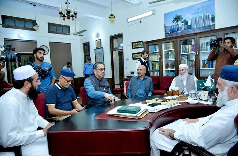 Caretaker Federal Minister for Religious Affairs and Interfaith Harmony Aneeq Ahmed is being briefed during his visit to new Hajji Camp