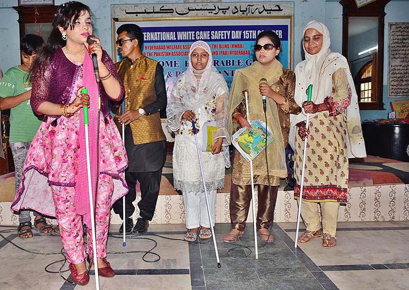 Blind youngsters performing in tableau during program in connection with World White Cane Safety Day organized by Pakistan Association of the Blind at Press Club Hall