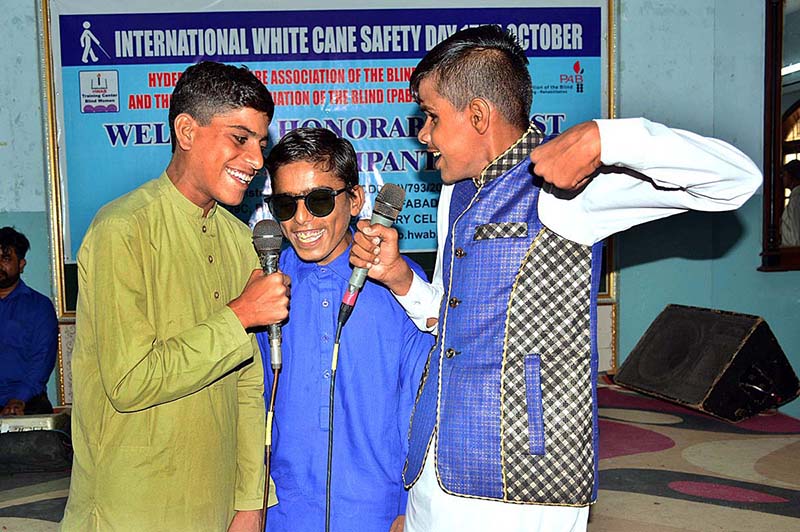 Blind youngsters performing in tableau during program in connection with World White Cane Safety Day organized by Pakistan Association of the Blind at Press Club Hall