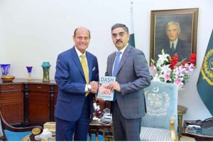 Hockey legend, former Captain of Pakistan National Hockey Team, Islahuddin Siddiqui presenting his book titled "Dash Through My Life" to Caretaker Prime Minister Anwaar-ul-Haq Kakar
