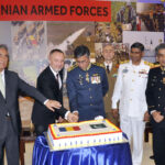 Eduard-Robert PREDA, Minister Plenipotentiary / Chargés d'affaires of Romania and Air Marshal Irfan Ahmad cutting cake to celebrate Romanian Armed Forces Day in Pakistan