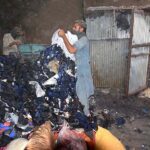 Workers busy in reprocessing the clothes for preparing quilts at their workplace