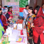 Visitors viewing the models made by students during the exhibition at Allied high School