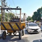 A view of trolley with electric transformer place on road in front of Company Bagh creating hurdle in smooth flow of traffic and needs the attention of concerned authorities