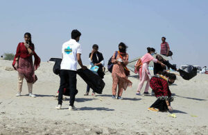 Students cleaning bank of Indus River after seminar on ‘water is life water is food’ during World Food Day organized by Food and Agriculture organization of United Nation