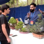 Students visit different stalls displayed during the Science Exhibition 2023 by Khwarizmi Science Society at Crescent School