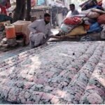 Worker busy in preparing quilt for upcoming winter season at their workplace as the demand of warm goods increased after the temperature dropping rapidly in the city.