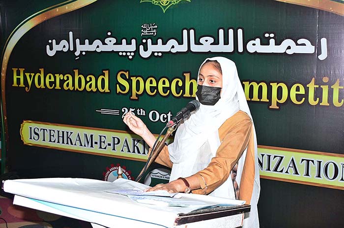 A student deliver her speech during Rehmatul-Lil-Alameen Hyderabad Speech Competition organized by Istehkam-e-Pakistan Organization at Press Club.