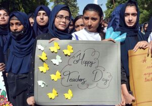 Students participating in a walk to mark World Teachers’ Day at University of Sargodha.