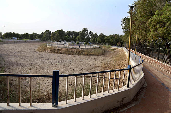 A view of dry pond at Rani Bagh needs the attention of concerned authorities.