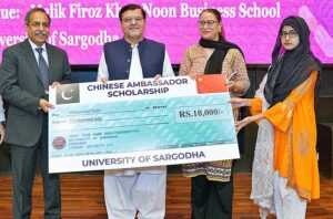 ice Chancellor University of Sargodha Dr. Qaiser Abbas distributing Chinese Ambassador Scholarship cheques among the students at University of Sargodha
