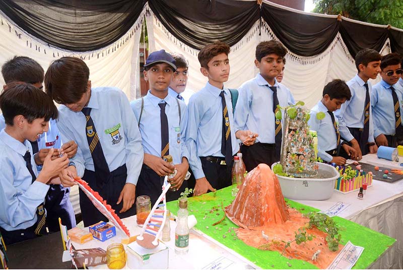 Students present models during the Science and Art Exhibition at La Salle Higher Secondary School.