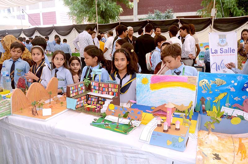 Students present models during the Science and Art Exhibition at La Salle Higher Secondary School.
