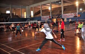 Players in action in badminton match during Punjab Badminton Provincial League (Men,Woman) under Prime Minister Talent Hunt Youth Programme held at Sports Gymnasium.