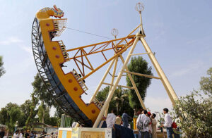 A Special girl capturing the moment through cell phone during World Sight Day organized by Indus Lions Club at Play Land Rani Bagh.