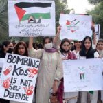 Students participating in a rally to express solidarity with Palestinians organized by Department of Political Science & International Relations at Government College Women University Faisalabad (GCWUF).
