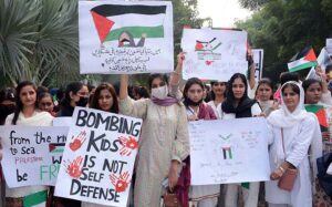Students participating in a rally to express solidarity with Palestinians organized by Department of Political Science & International Relations at Government College Women University Faisalabad (GCWUF).
