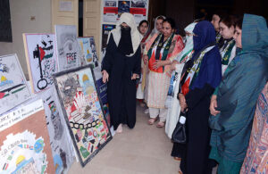 Students participating in a rally to express solidarity with Palestinians organized by Department of Political Science & International Relations at Government College Women University Faisalabad (GCWUF).