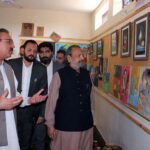 Caretaker Federal Minister for Education and Professional Training Madad Ali Sindi viewing artwork made by prisoners during his visit to Central Jail.