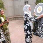 The visitors taking keen interest in the stuff during the last day of the exhibition at Masjid Wazir Khan managed by the Fortnight School System