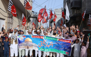 Large number of people attending a rally in solidarity with Palestine during an anti-Israel demonstration at MDA Chowk.