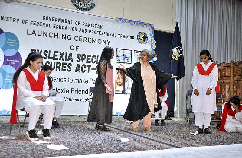 Federal Secretary for Ministry of Federal Education and Professional Training Waseem Ajmal Chaudhry release balloon during launching ceremony of Dyslexia Special Measures Act-2022 IMCG F-6/2