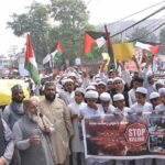 Maulana Raghib Naimi addressing the rally to express solidarity with the Palestinians outside Press club.