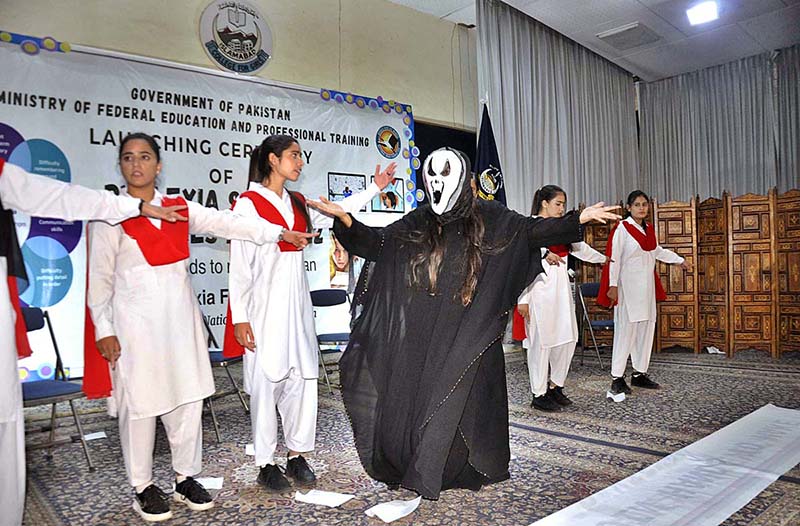 Federal Secretary for Ministry of Federal Education and Professional Training Waseem Ajmal Chaudhry release balloon during launching ceremony of Dyslexia Special Measures Act-2022 IMCG F-6/2