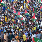A large number of people participating in a rally to support Palestinians near Tower area.
